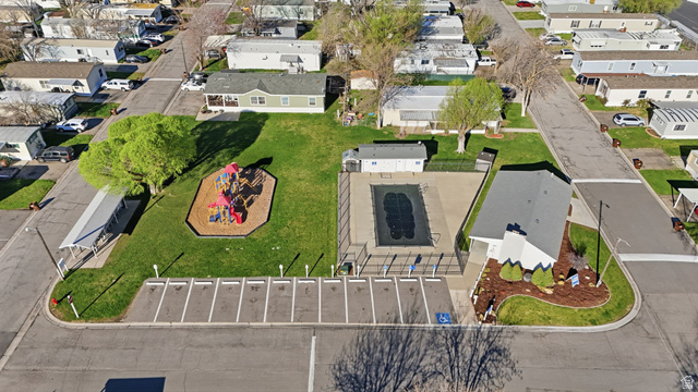 2491 Highway 89, Unit 523 Pleasant View, UT 84404 - Photo 31 of 31 Aerial perspective of community pool and playground