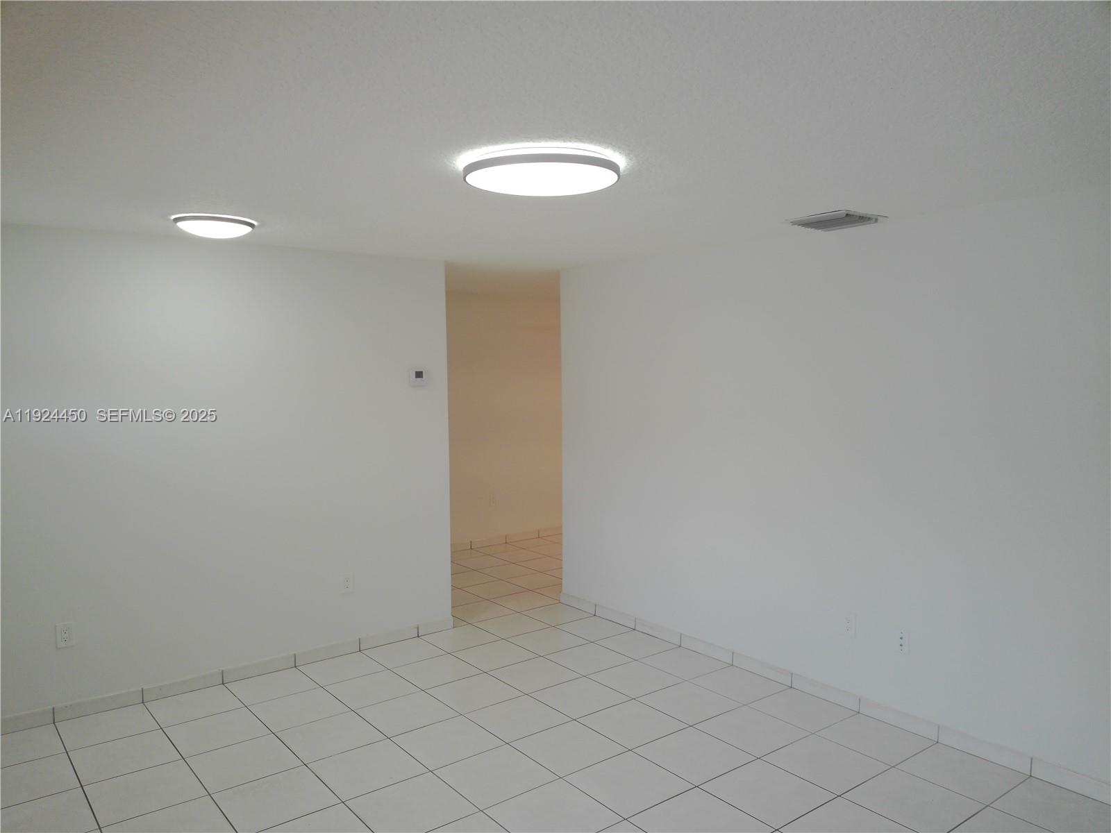 10812 Southwest 33rd Street Miami, FL 33165 - Photo 18 of 18 a view of an empty room