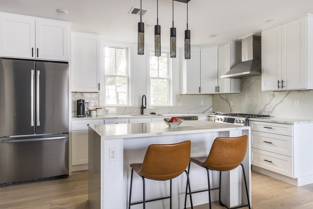 81-83 Alpine Street, Unit 2 Somerville, MA 02144 - Photo 1 of 24 a kitchen with appliances cabinets and a sink