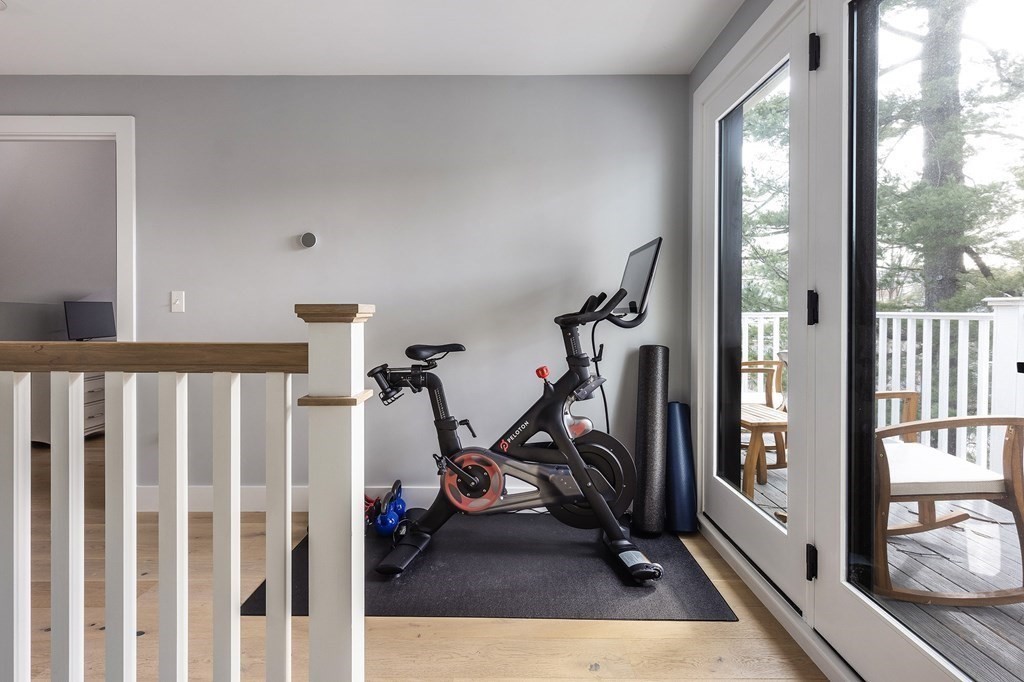 81-83 Alpine Street, Unit 2 Somerville, MA 02144 - Photo 11 of 24 a view of a room with gym equipment