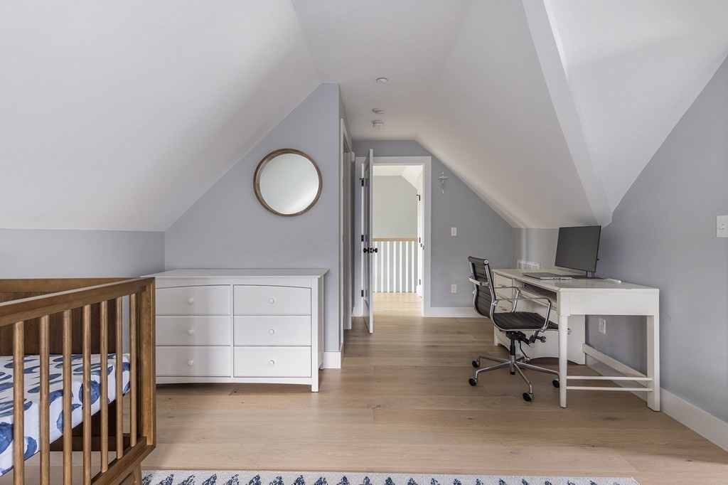 81-83 Alpine Street, Unit 2 Somerville, MA 02144 - Photo 17 of 24 a view of a livingroom with furniture and a fan