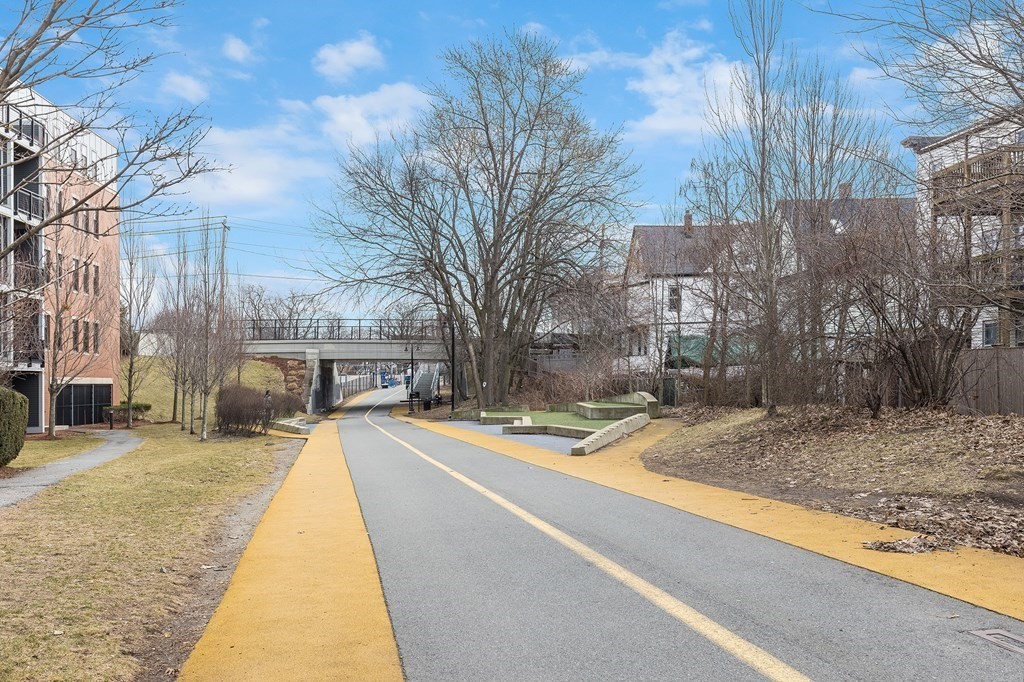 81-83 Alpine Street, Unit 2 Somerville, MA 02144 - Photo 24 of 24 a view of a house with snow on the road