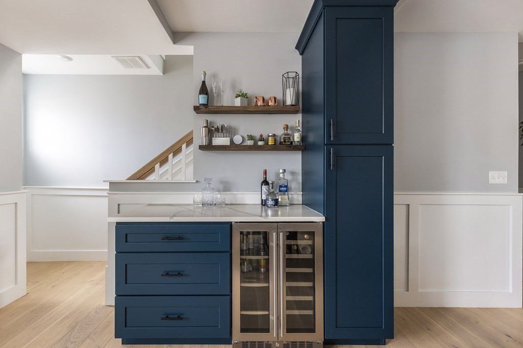 81-83 Alpine Street, Unit 2 Somerville, MA 02144 - Photo 7 of 24 a view of cabinets and wooden floor