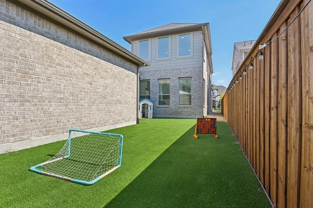 a view of a backyard with a garden