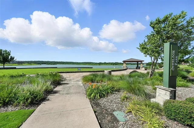 a view of a lake with a big yard