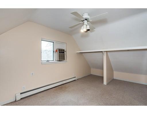 56 Hardy Pond Road Waltham, MA 02451 - Photo 11 of 12 a view of an empty room with a window