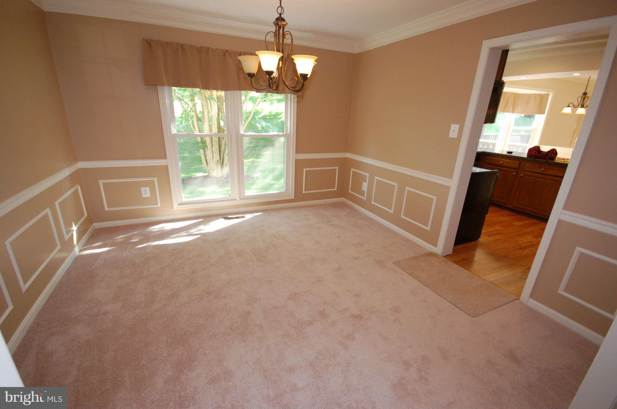 13807 Turnmore Road Silver Spring, MD 20906 - Photo 8 of 26 a view of an empty room with a window