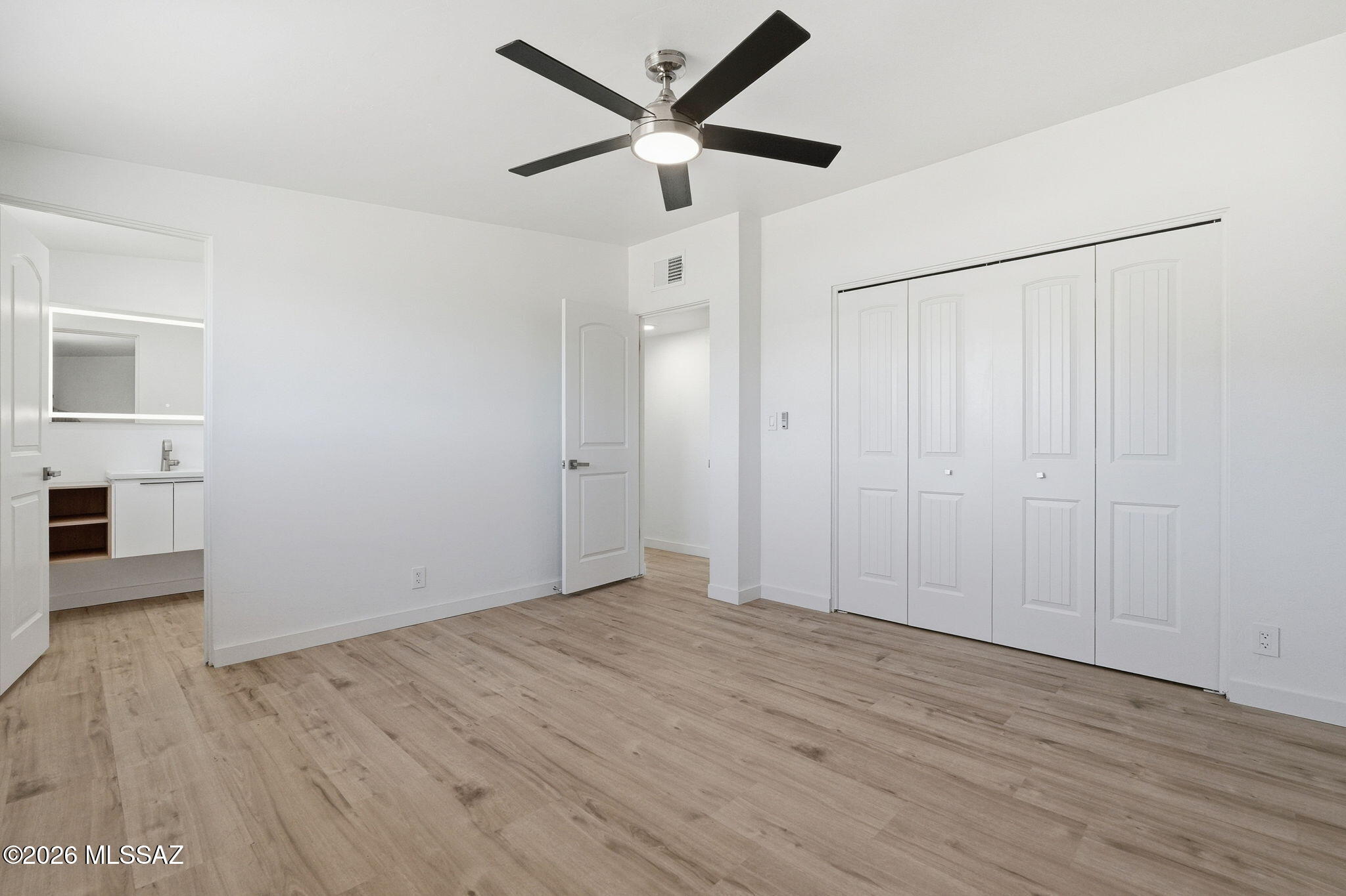 950 West Ina Road Tucson, AZ 85704 - Photo 23 of 54 wooden floor in an empty room
