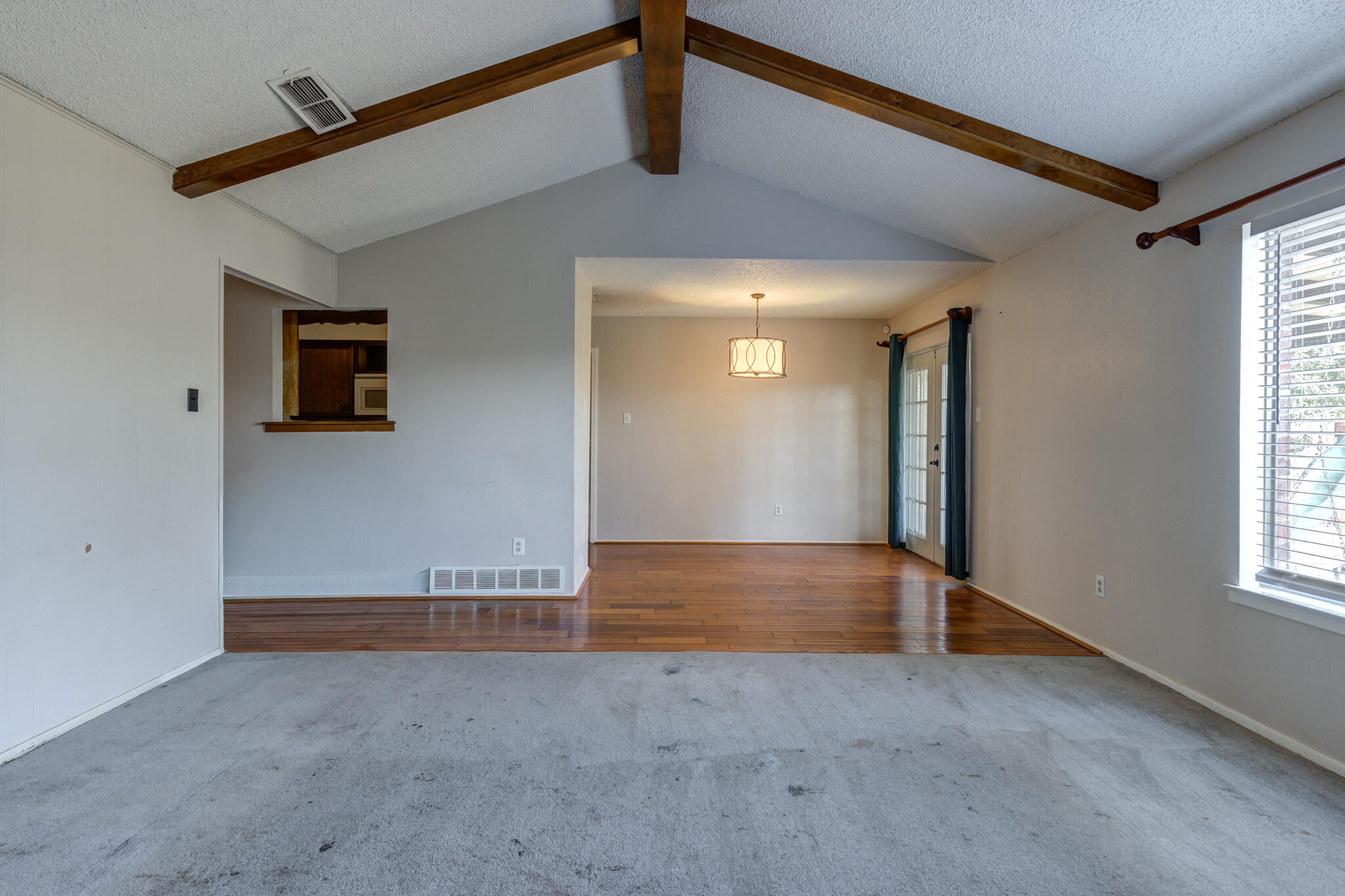 5018 70th Street Lubbock, TX 79424 - Photo 9 of 27 an empty room with windows