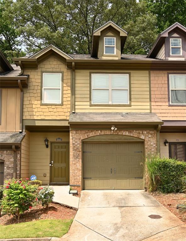 2915 Hillside Decatur, GA 30034 - Photo 1 of 1 a front view of a house with a yard and garage