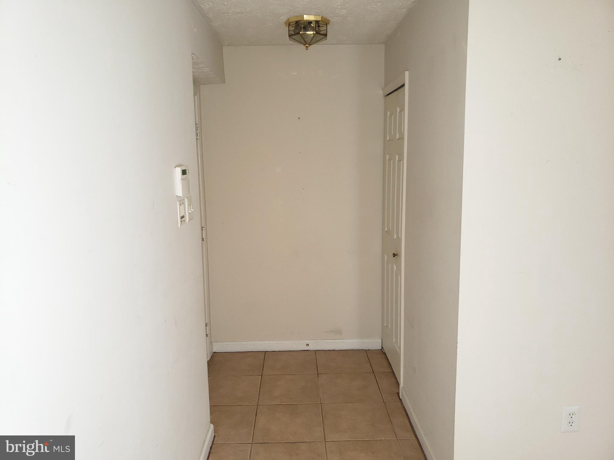 4915 Riders Court Owings Mills, MD 21117 - Photo 11 of 23 UNIT ENTRY FOYER