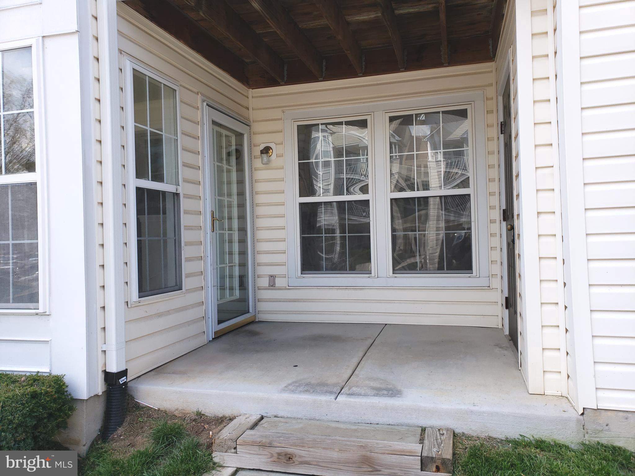 4915 Riders Court Owings Mills, MD 21117 - Photo 4 of 23 REAR OF BUILDING - REAR UNIT DOOR ENTRY
