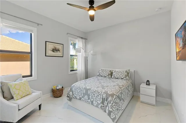 a bedroom with a bed and furniture