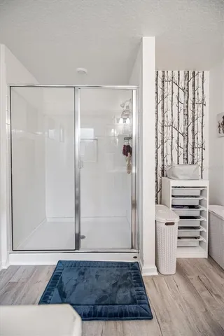 a white toilet sitting next to a bathroom sink