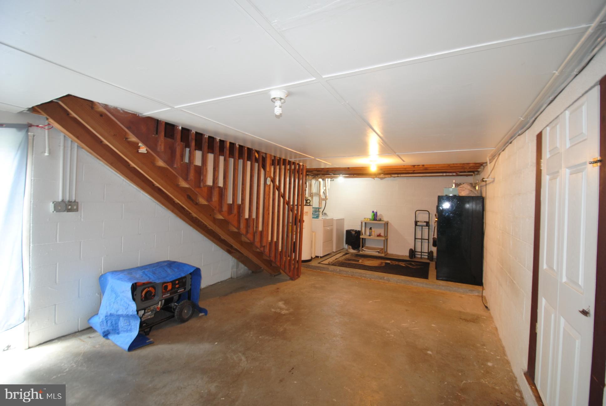 345 Sinking Spring Lane Gore, VA 22637 - Photo 18 of 30 a view of a hallway with staircase