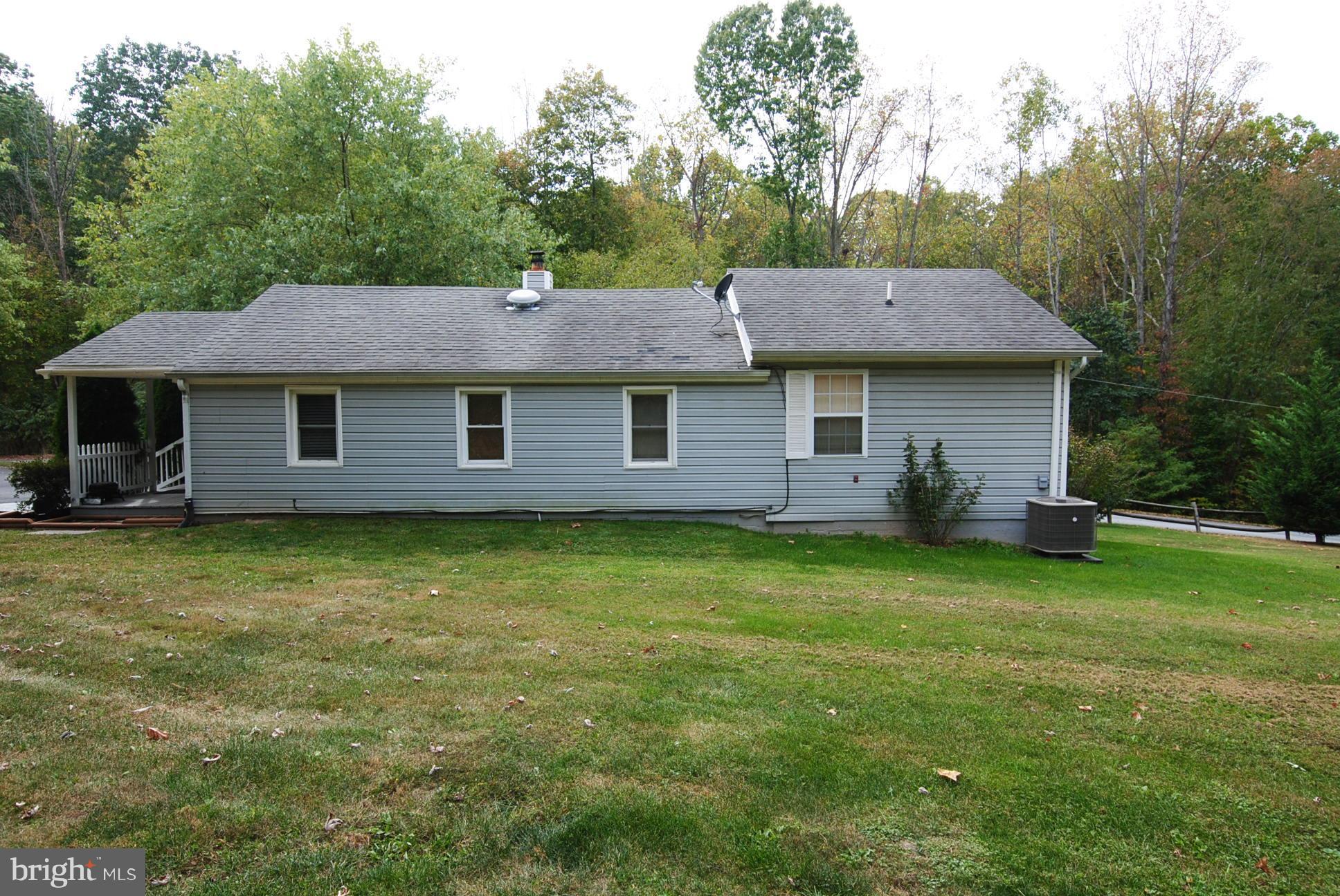 345 Sinking Spring Lane Gore, VA 22637 - Photo 22 of 30 a aerial view of a house with a garden