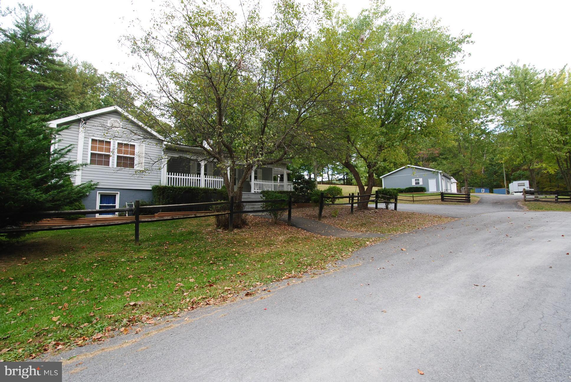 345 Sinking Spring Lane Gore, VA 22637 - Photo 23 of 30 a view of a house with a outdoor space