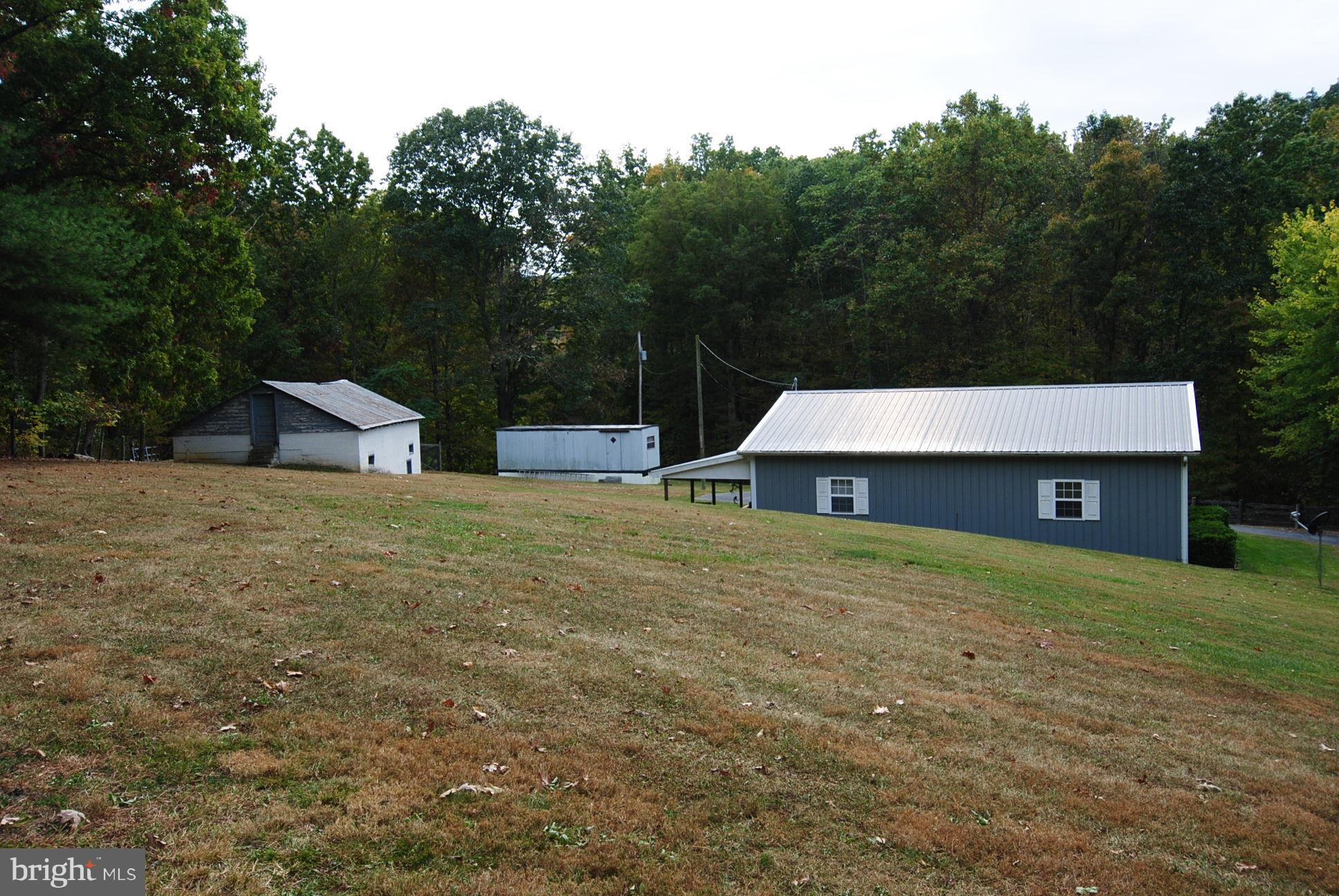 345 Sinking Spring Lane Gore, VA 22637 - Photo 29 of 30 a house view with a garden