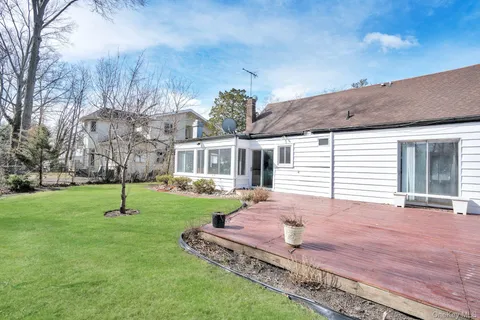 a house view with a garden space
