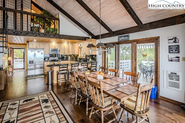 a very nice looking room with lots of tables and chairs