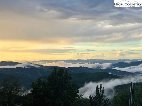 a view of lake and mountain