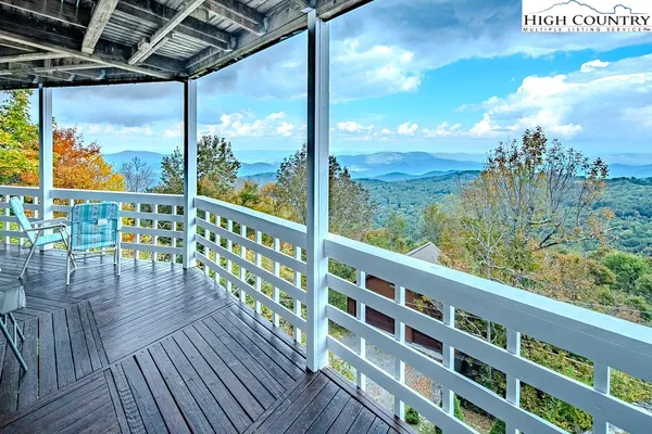 an aerial view of a house with a balcony