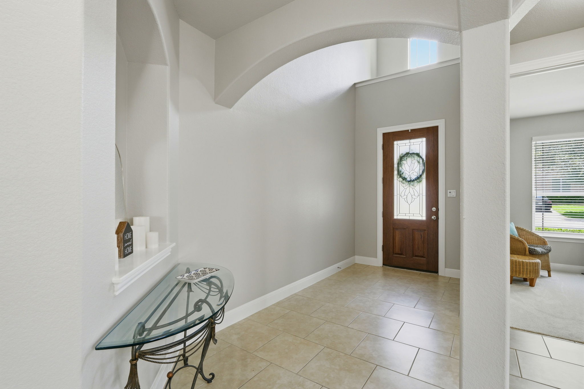 110 Dasher Drive Cedar Park, TX 78613 - Photo 6 of 39 Enter into a bright foyer, distinguished by elegant arched details and durable tiled flooring.