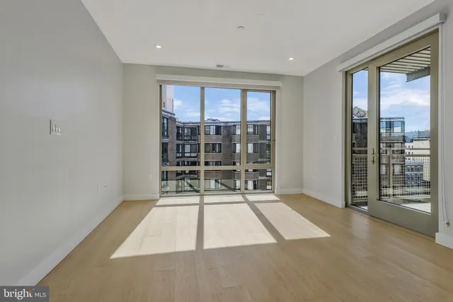a room with walk in closet and window