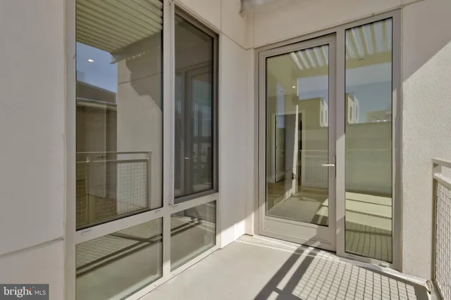 a bathroom with a tub and shower