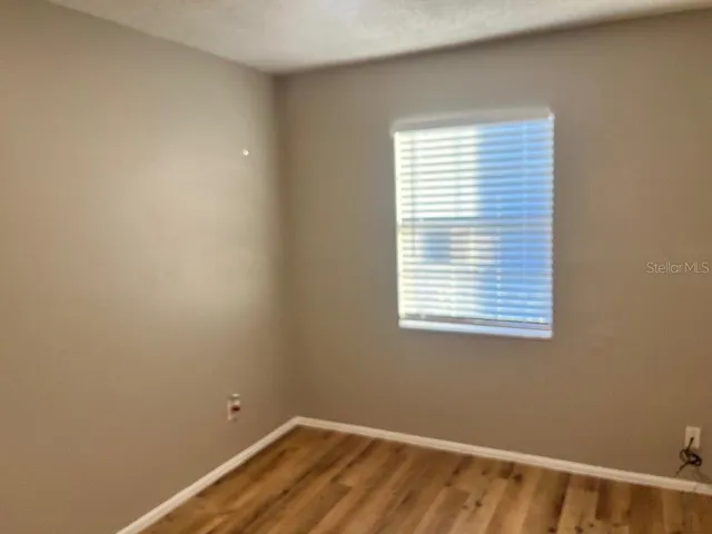 a view of a room with a window