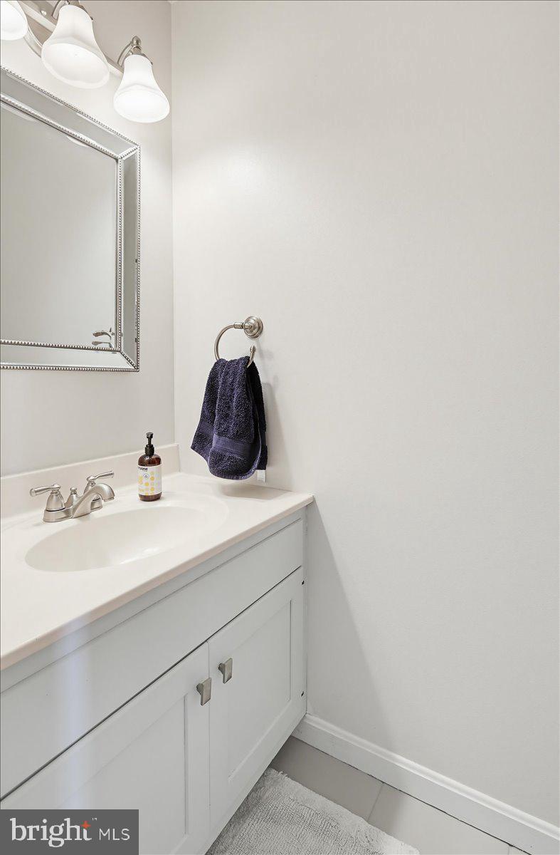 20128 Gunpowder Road Manchester, MD 21102 - Photo 15 of 66 a bathroom with a sink and a mirror