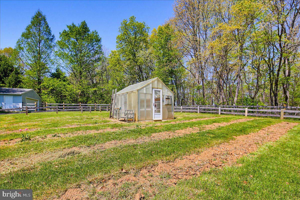 20128 Gunpowder Road Manchester, MD 21102 - Photo 40 of 66 a view of a house with swimming pool and a yard