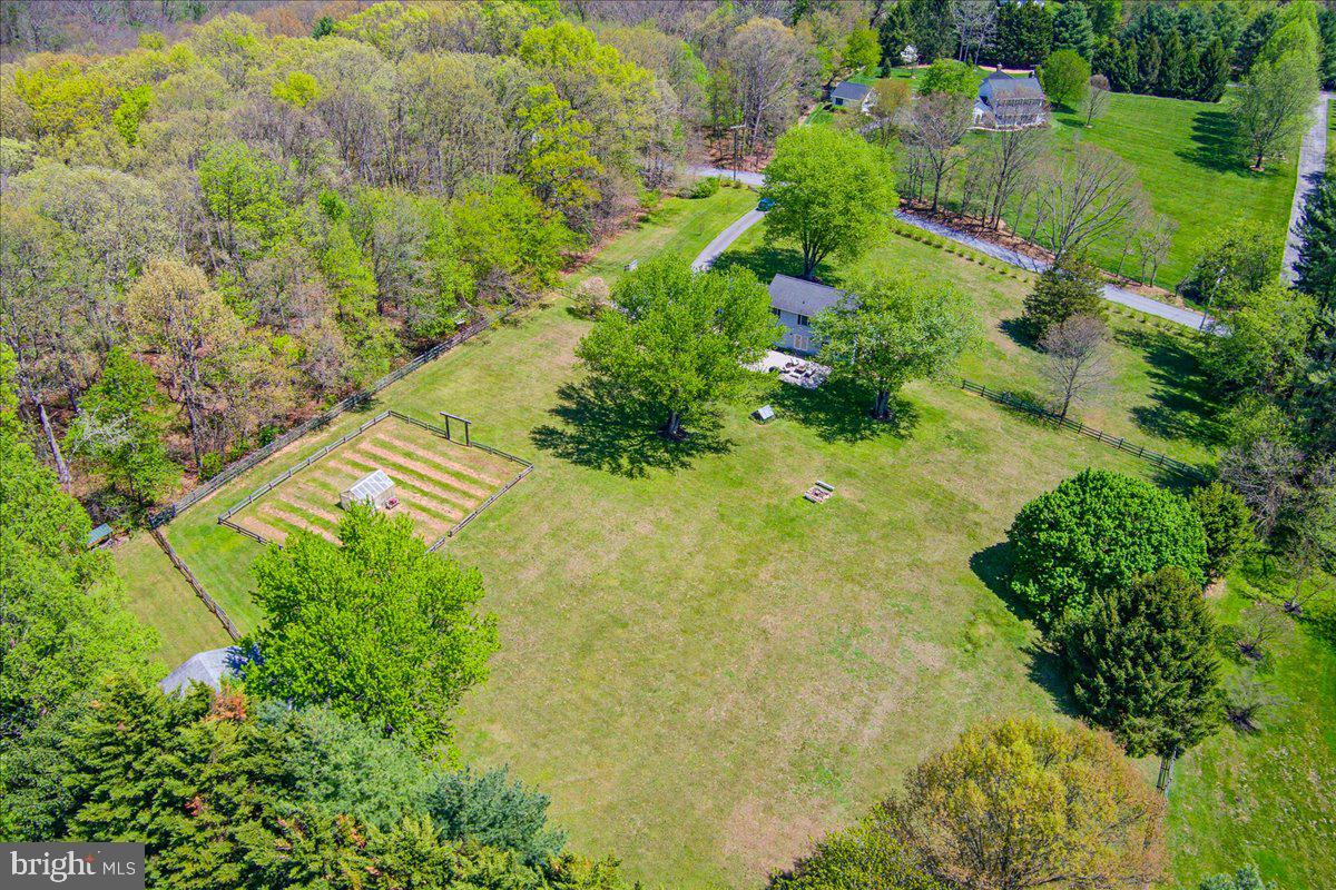 20128 Gunpowder Road Manchester, MD 21102 - Photo 45 of 66 a view of a garden with an outdoor space
