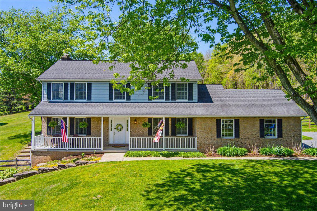 20128 Gunpowder Road Manchester, MD 21102 - Photo 60 of 66 front view of a house with a yard