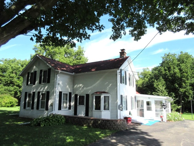 2118 Grand Detour Road Dixon, IL 61021 - Photo 1 of 16 front view of house with a yard