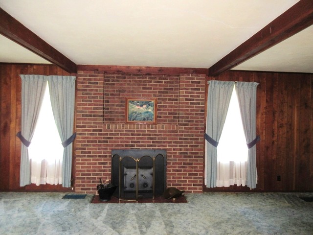 2118 Grand Detour Road Dixon, IL 61021 - Photo 14 of 16 a brick house with stairs and a fireplace