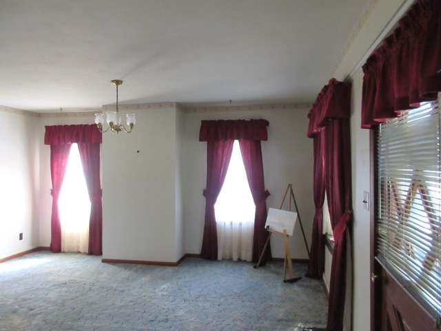 2118 Grand Detour Road Dixon, IL 61021 - Photo 15 of 16 a view of empty room with wooden floor and windows