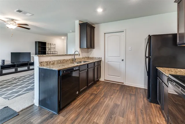 a view of swimming pool with a yard