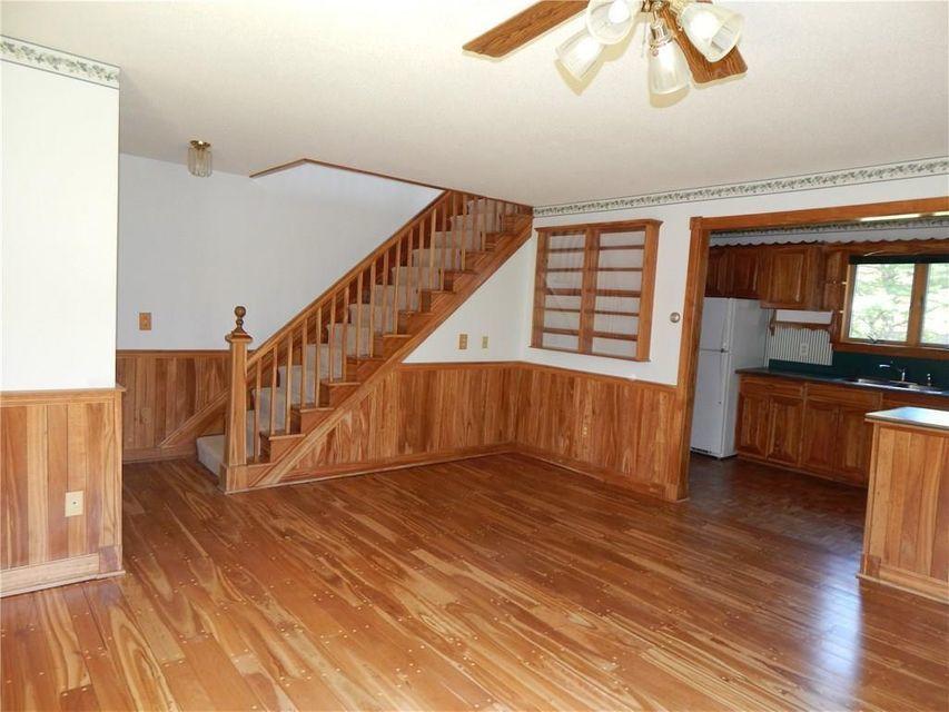 692 Main Road Holden, ME 04429 - Photo 4 of 36 Unit 1 LR & Kitchen