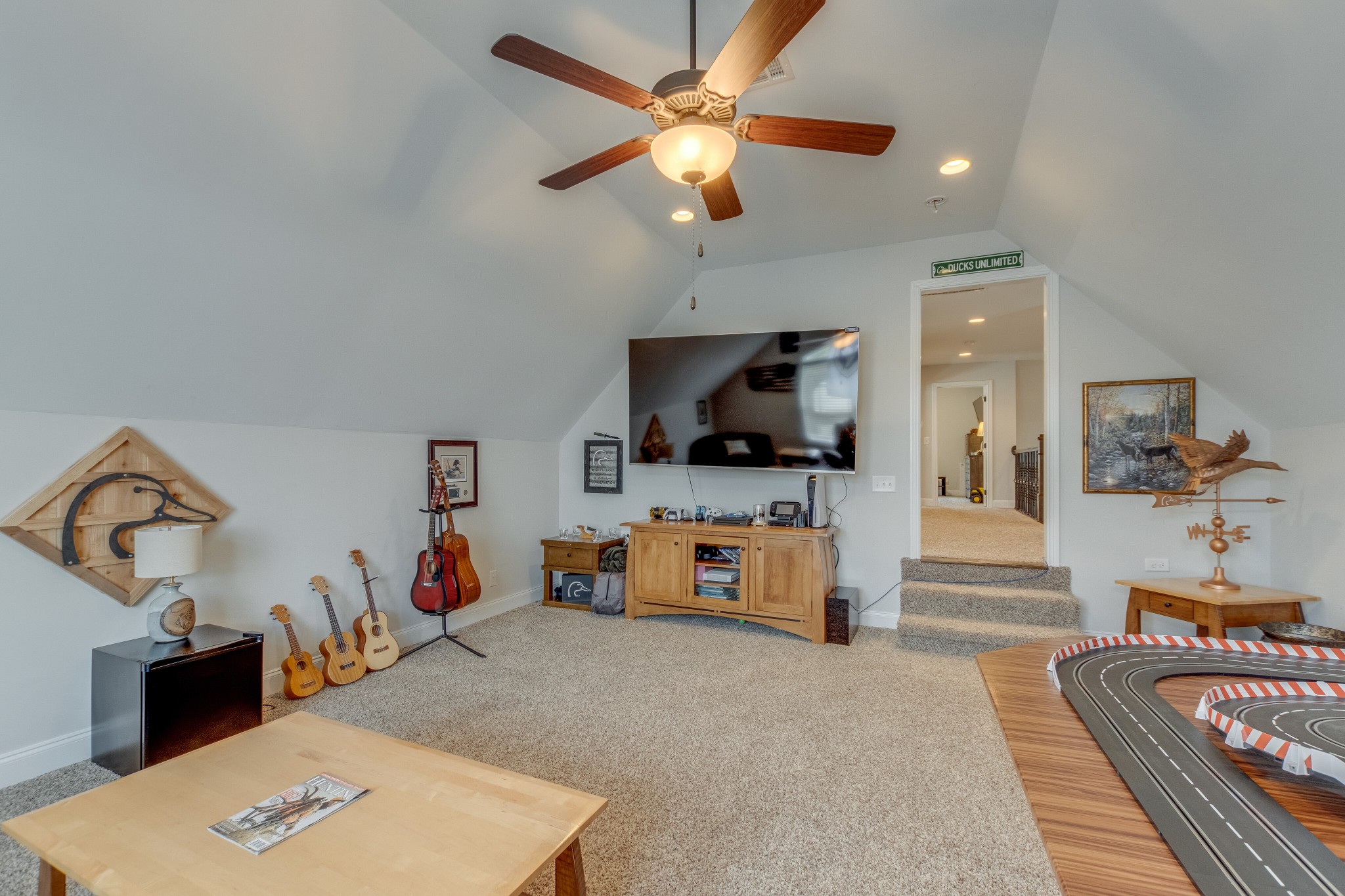 1755 Chicken Road Lebanon, TN 37090 - Photo 22 of 34 a living room with furniture and a flat screen tv