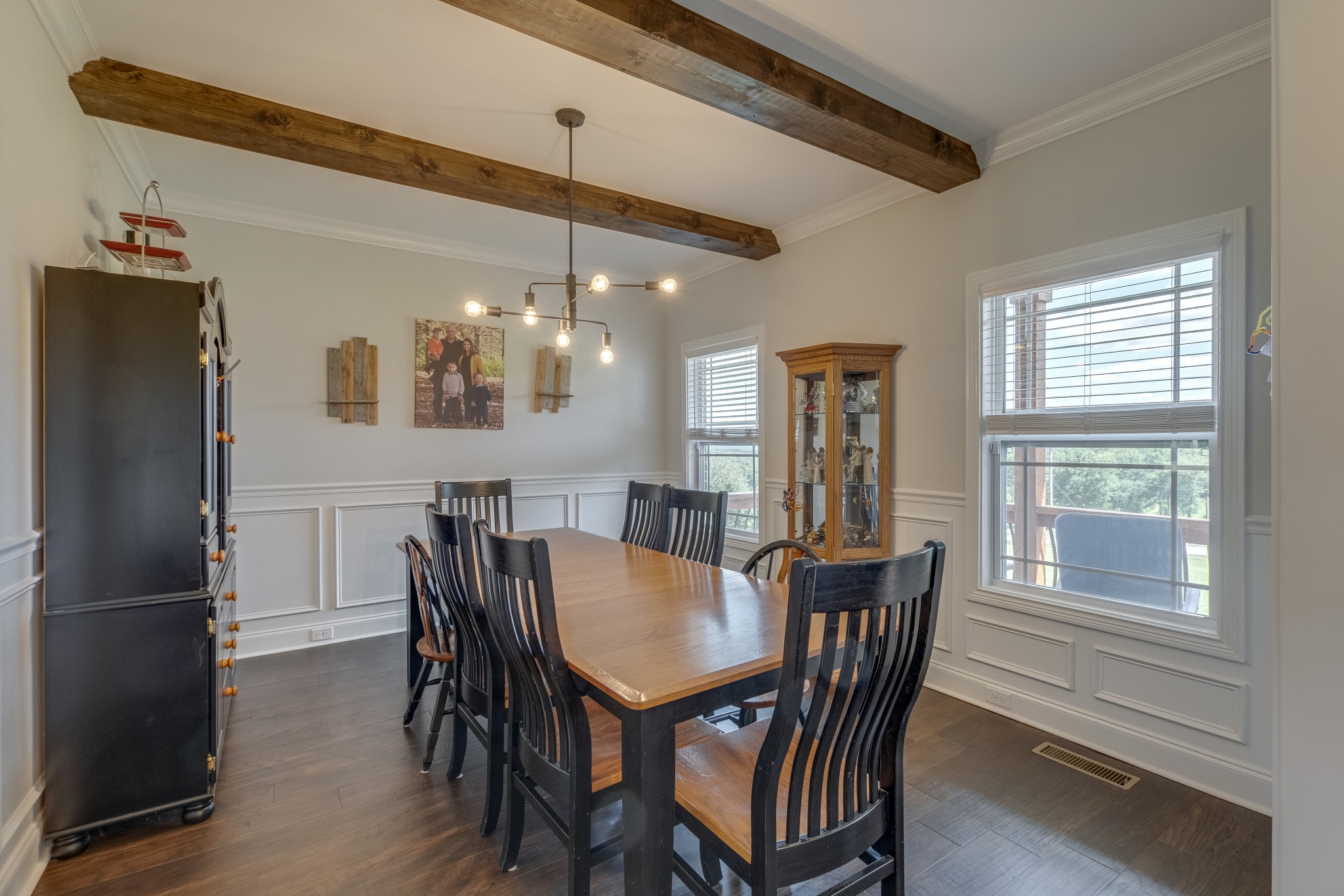 1755 Chicken Road Lebanon, TN 37090 - Photo 8 of 34 a view of a dining room with furniture window and wooden floor