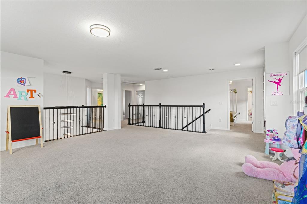 5945 Newberry Pnes Avenue Wesley Chapel, FL 33545 - Photo 30 of 55 a view of an empty room