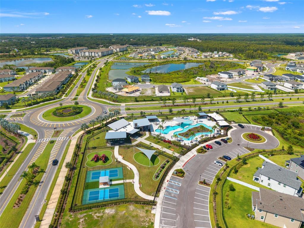 5945 Newberry Pnes Avenue Wesley Chapel, FL 33545 - Photo 53 of 55 an aerial view of a swimming pool with outdoor seating