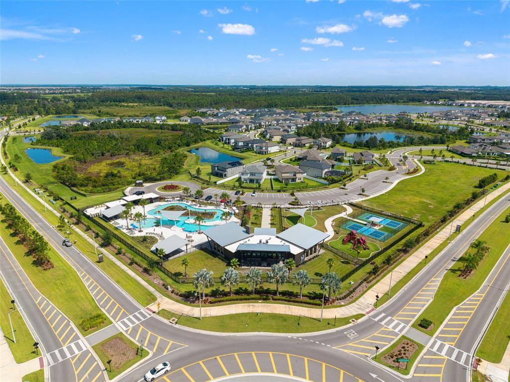 5945 Newberry Pnes Avenue Wesley Chapel, FL 33545 - Photo 54 of 55 a view of a swimming pool with a balcony