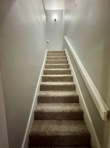 a view of a room with an empty space