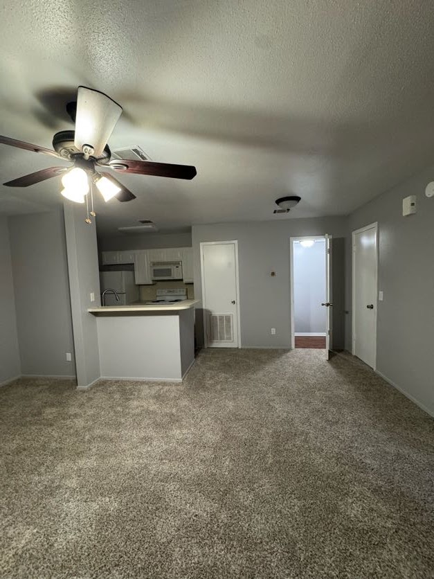 1305 West Villa Maria Road, Unit C107 Bryan, TX 77801 - Photo 7 of 19 a view of a kitchen with a sink