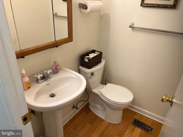 a bathroom with a sink and a toilet