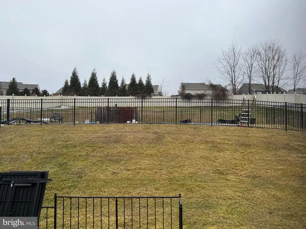 a view of house with outdoor space