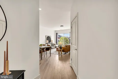 a view of a living room and dining room