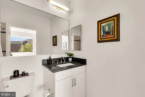 a sink and a mirror in a bathroom
